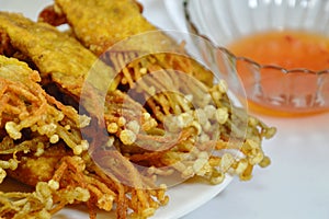 Enokitake mushroom fried dumpling wrapper with sweet chili sauce