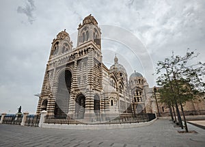 Enormous Marseilles Cathedral foreground in a cloudy day