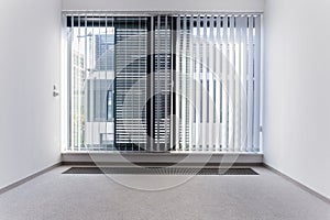 Enormous window in empty office photo