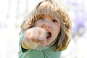 Enraged kid boy with angry expression. Angry hateful little rage boy, child furious. Angry rage kids face. Anger child