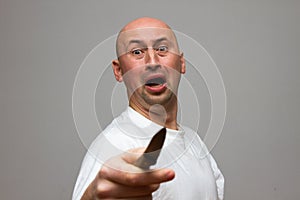 Enraged man with knife