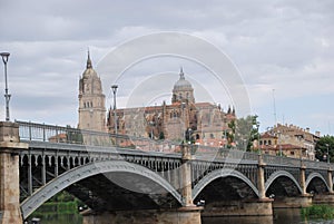 Enrique Esteban Bridge and New Cathedral of Salamanca, Salamanca Spain photo