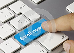Enroll now - Inscription on Blue Keyboard Key