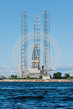 Ensco 101 floating drilling rig, drilling cranes, vessels and mining platforms in Kronstadt on Navy Day. Kronstadt