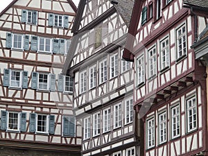 Ensemble of three tall half-timbered houses in Schwaebisch Hall, Germany