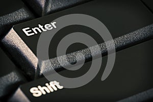 Enter button on black computer keyboard; Macro photo