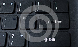Enter button on laptop keyboard. Enter keyboard key button on a computer. Close up of Enter key of Laptop computer.