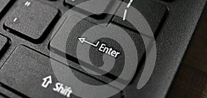 Enter button on laptop keyboard. Enter keyboard key button on a computer. Close up of Enter key of Laptop computer.