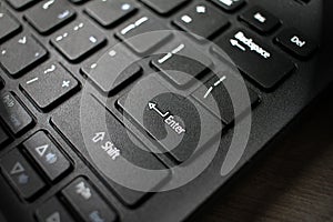 Enter button on laptop keyboard. Enter keyboard key button on a computer. Close up of Enter key of Laptop computer.