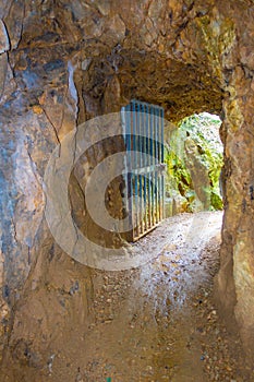 Enter of historic rail tunnel, a part of an old gold mine transportation system located in North Island in New Zealand