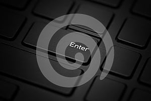The enter key on a black laptop