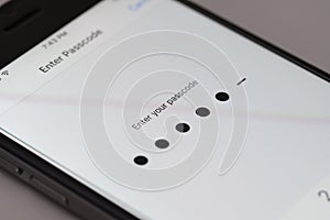 Enter passcode screen of an iPhone running iOS 9