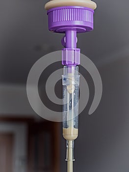 Enteral feeding dropper