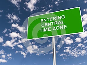 entering central time zone traffic sign on blue sky