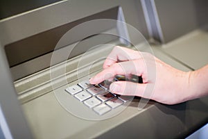 Entering PIN on an ATM