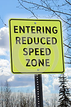 Entering reduced speed zone sign