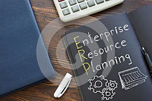 Enterprise Resource Planning ERP is shown on the business photo using the text