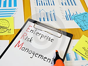 Enterprise Risk Management ERM is shown on the conceptual business photo