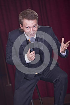 Entertainer with microphone photo