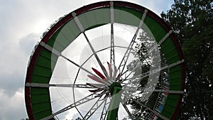 Entertainment attraction Surprise in the park of recreation and entertainment. Children and adults ride the carousel. An