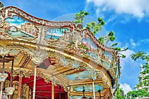 Entertainment Carousel for the youngest children. Horses on a ca