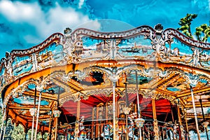 Entertainment Carousel for the youngest children. Horses on a carnival