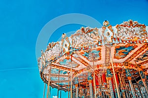 Entertainment carousel for the youngest children. Horses on a carnival