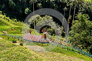 Entertainment center in Valle del Cocora Valley with tall wax palm trees. Salento, Quindio department. Colombia