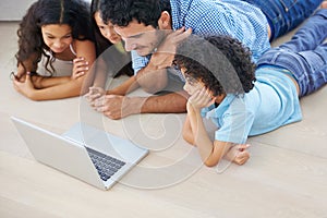 Enthralled by the internet. a handsome father bonding with his daughter.