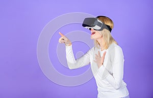Enthralling interaction virtual reality. Woman head mounted display violet background. Virtual reality and future