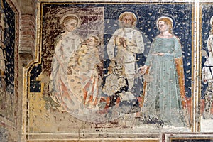 Enthroned Madonna and Child, Saints George, Catherine and a worshipper Knight
