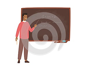 Enthusiastic African American male school teacher, college professor or lecturer standing beside chalkboard, holding