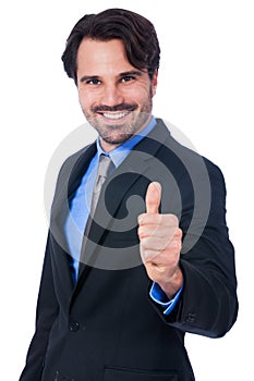 Enthusiastic businessman giving a thumbs up