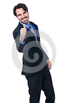 Enthusiastic businessman giving a thumbs up