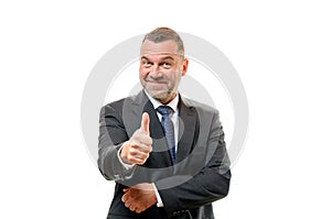 Enthusiastic businessman giving a thumbs up