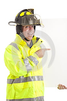 Enthusiastic Firefighter with Sign