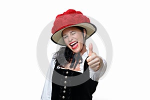 Enthusiastic laughing young Black Forest waitress