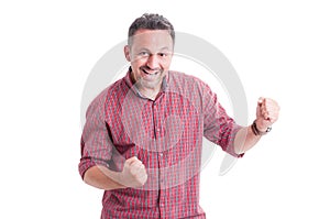 Enthusiastic man expressing excitement