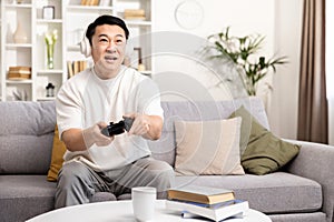 Enthusiastic Man Playing Video Game in Living Room