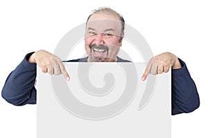 Enthusiastic man pointing to a blank white sign