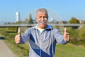 Enthusiastic motivated man giving a thumbs up