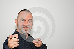 Enthusiastic motivated man pointing at the camera