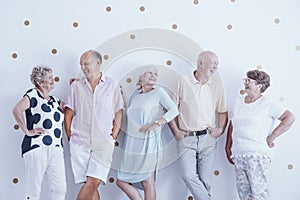 Enthusiastic smiling elderly people