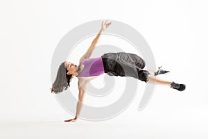 Enthusiastic Woman Balancing On Hand While Performing Breakdance