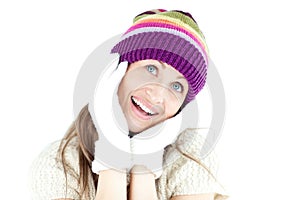 Enthusiastic young woman in the winter with gloves