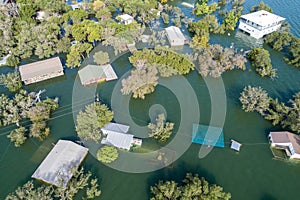 Entire Neighborhood Under water Climate Change Flooding with a House Under water photo