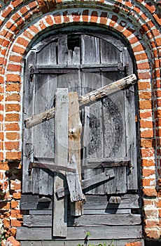 Entrance of abandoned orthodox church photo