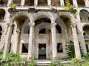 Entrance of abandoned Soviet sanatorium Iveria in Tskaltubo, Georgia. photo