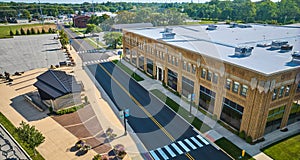 Entrance aerial view of ACD Automobile Museum with parking lot on bright sunny day