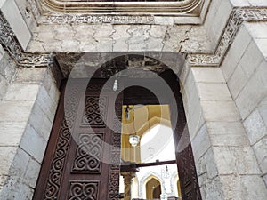 Entrance of Al-Aqmar Mosque in Cairo, Egypt - Ancient architecture - Holy Islamic site - Africa religious tour